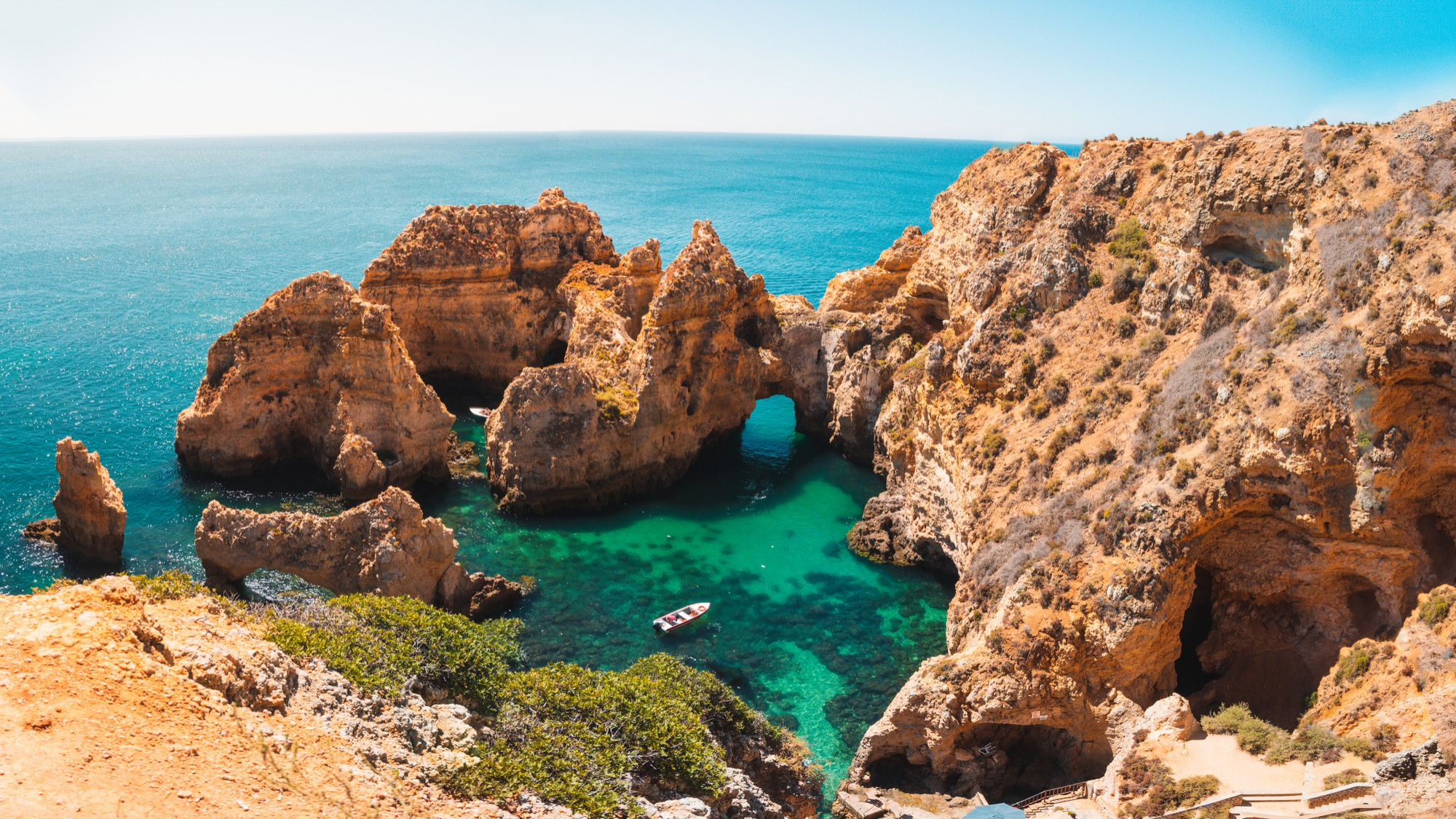 Algarve coastline near Portimão — golden cliffs and turquoise sea