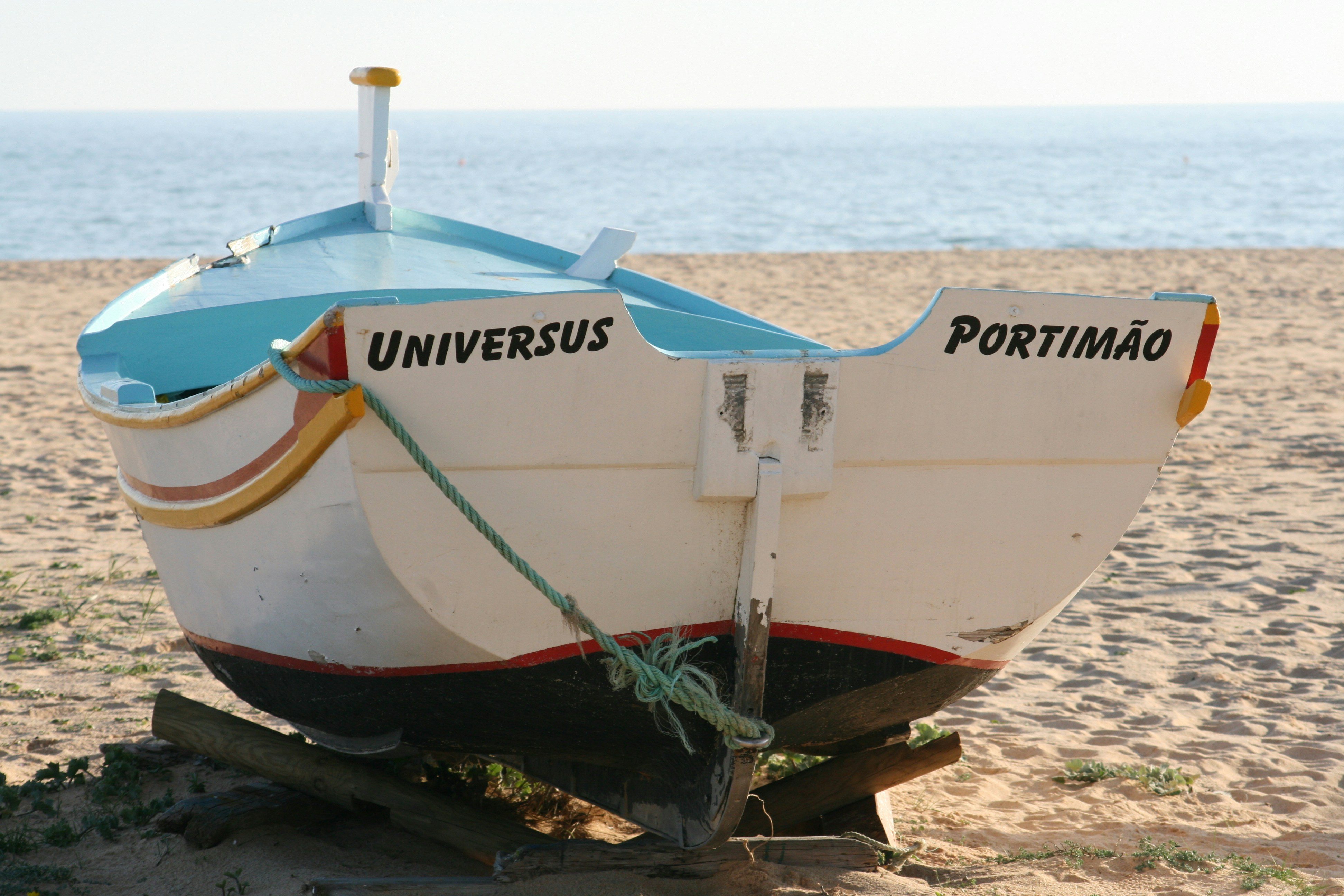 Traditional fishing boat on the beach in Portimão